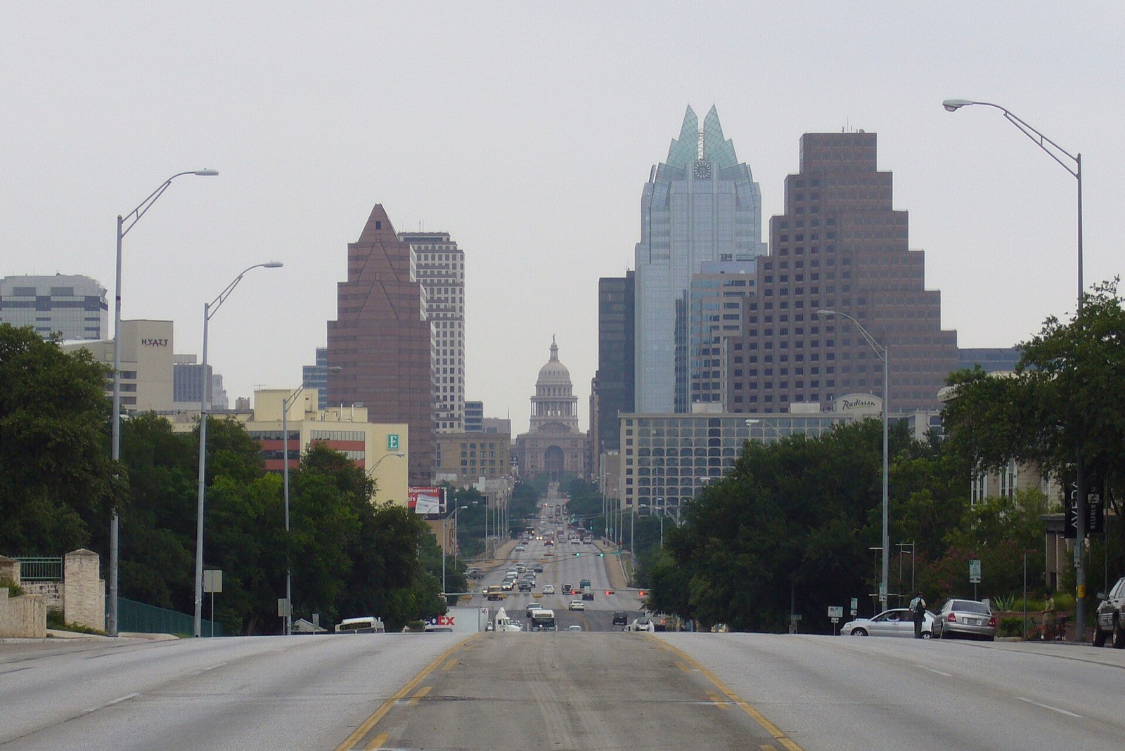 South Congress Avenue in Austin looking north toward the dome of the Texas State Capitol, with the downtown towers behind